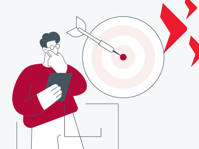 Person with laptop pointing at a financial chart